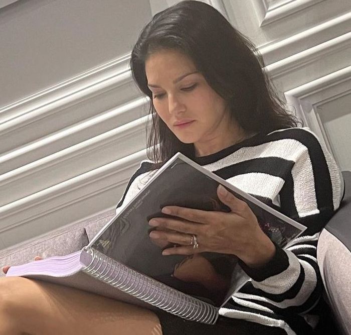 Sunny Leone Prepares For Her Next Film; Seen Reading A Big Script